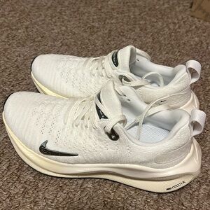 White NIKE Infinity RN4 — women’s road running shoes. Size 6. Brand new.